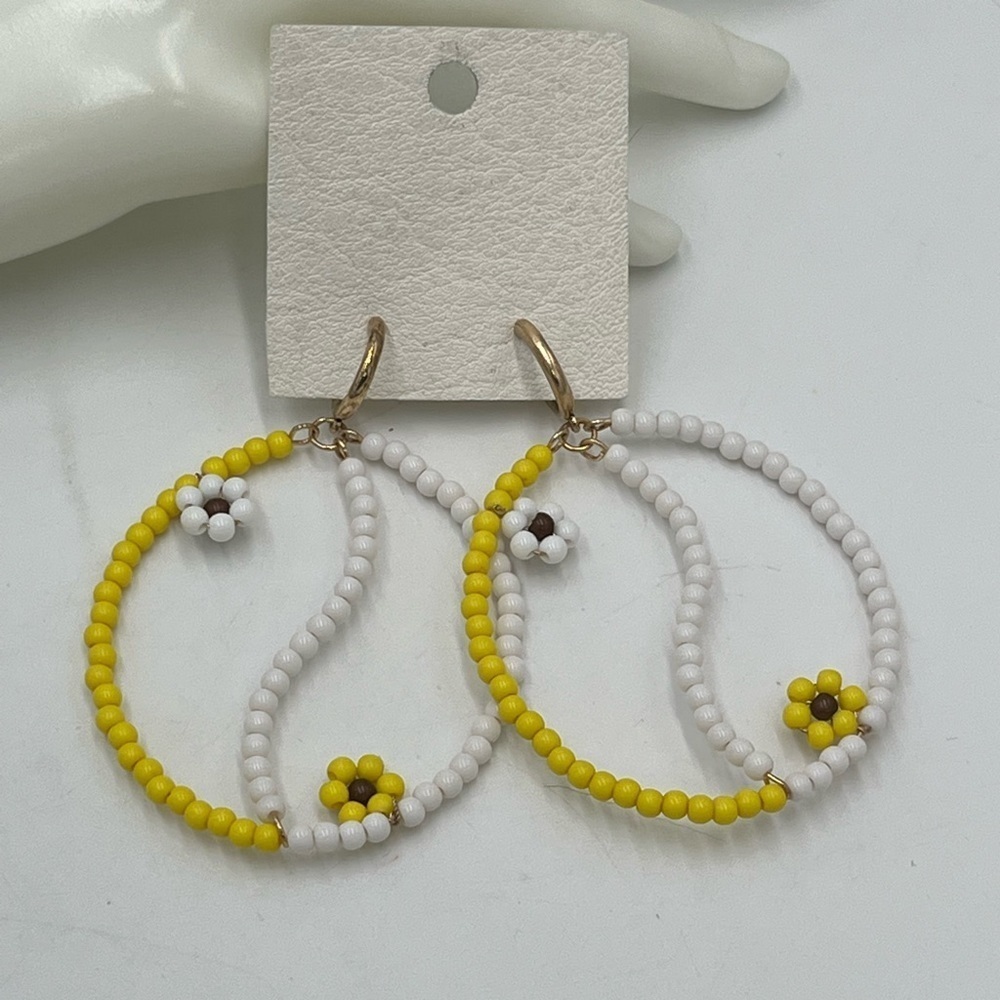 FREE PEOPLE AMONG THE WILDFLOWERS HOOP YIN AND YANG‎ YELLOW/WHITE  EARRINGS